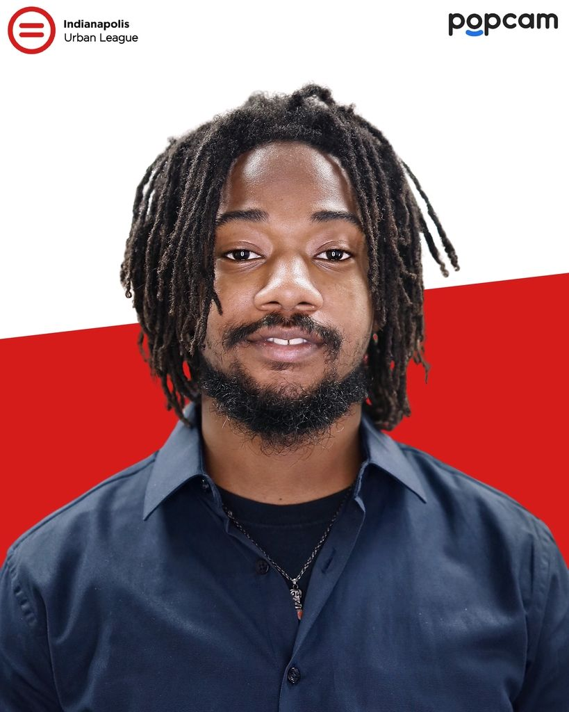 Indianapolis Urban League branded headshot of a man in a navy shirt